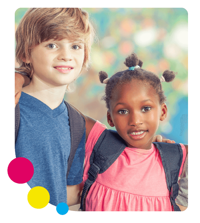 A happy, diverse friendship group stand together at school with colourful circles